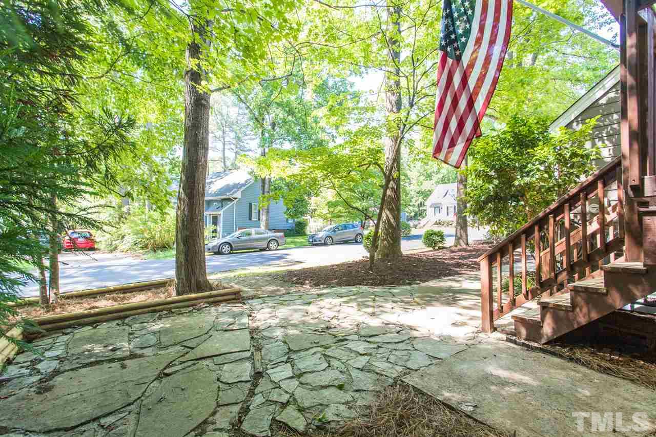 4513 Lancashire Drive Raleigh, NC 27613 - Photo 24 of 25 a view of yard with tree