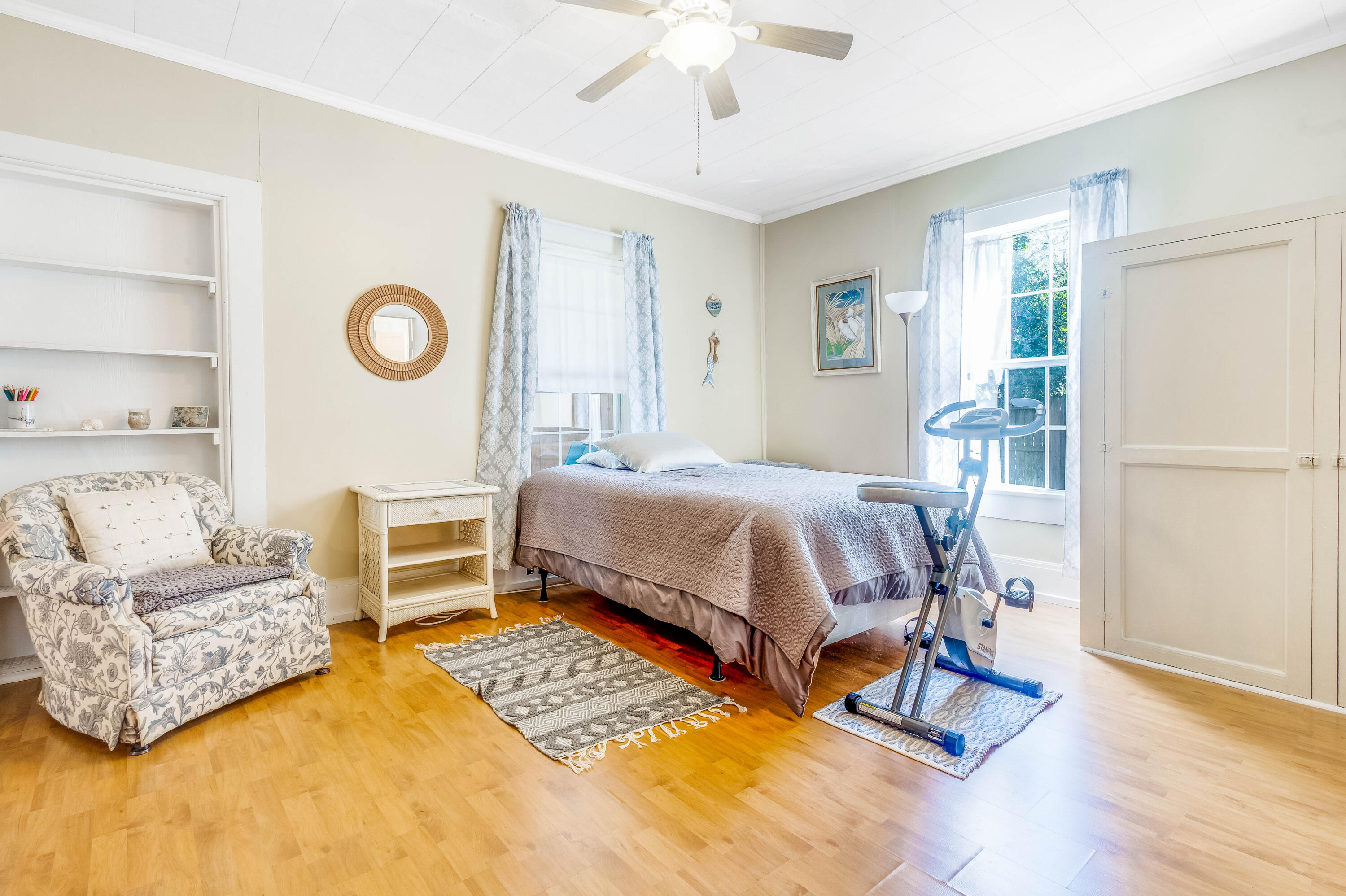 21132 Seminole Street Florala, AL 36455 - Photo 12 of 44 a bedroom with a bed dresser and a window