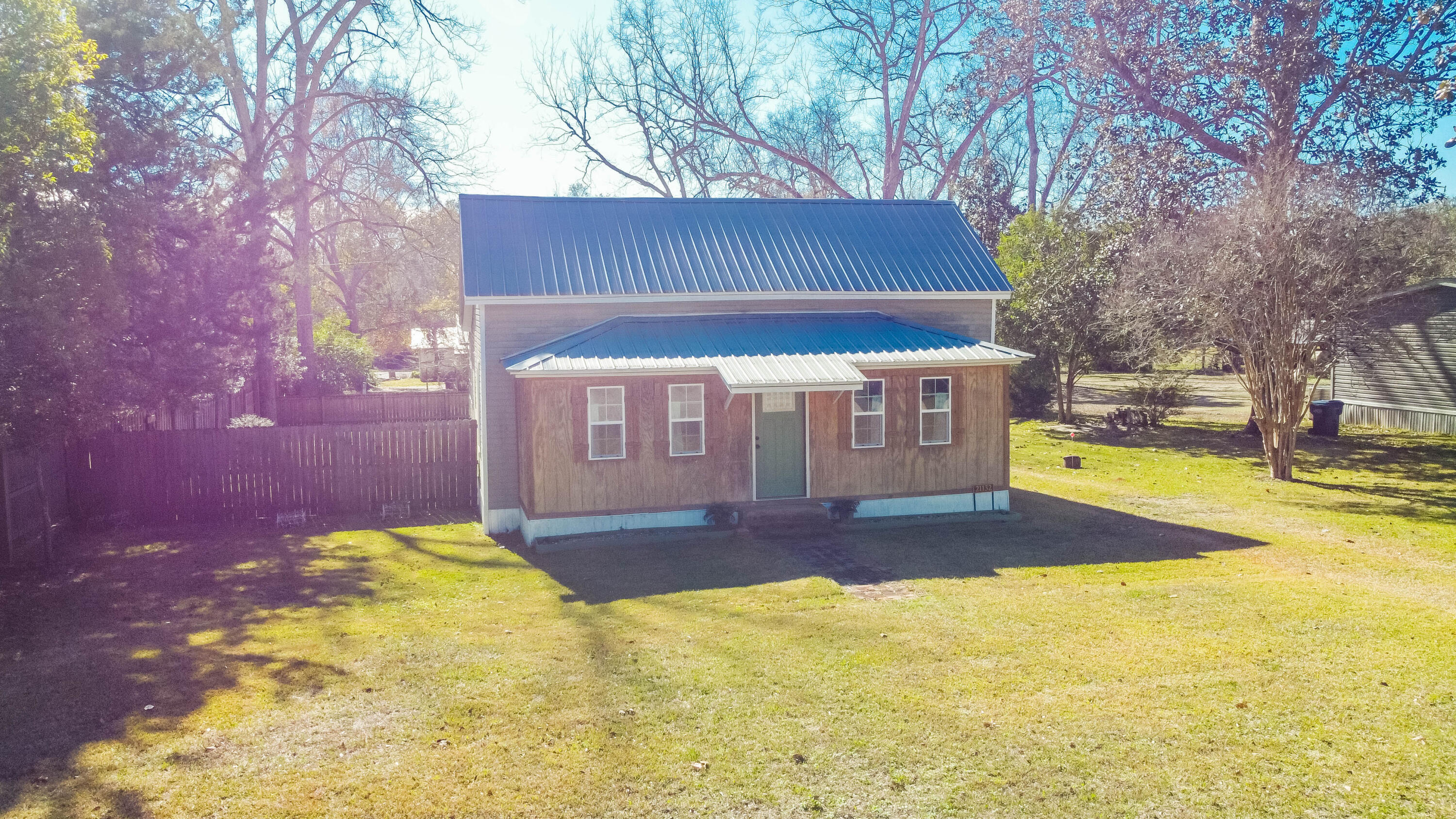 21132 Seminole Street Florala, AL 36455 - Photo 2 of 44 a view of swimming pool with a yard