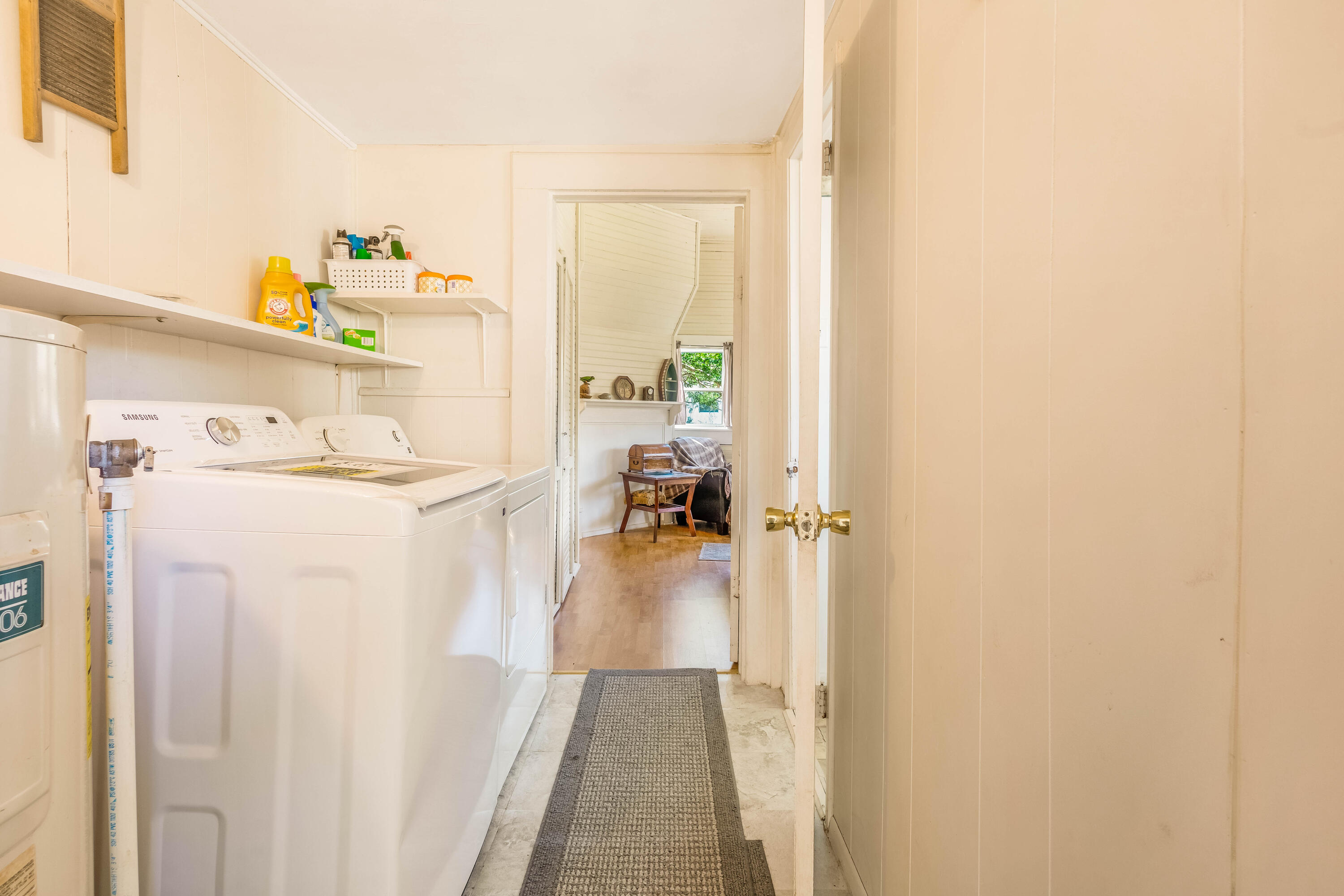 21132 Seminole Street Florala, AL 36455 - Photo 22 of 44 a utility room with sink dryer and washer