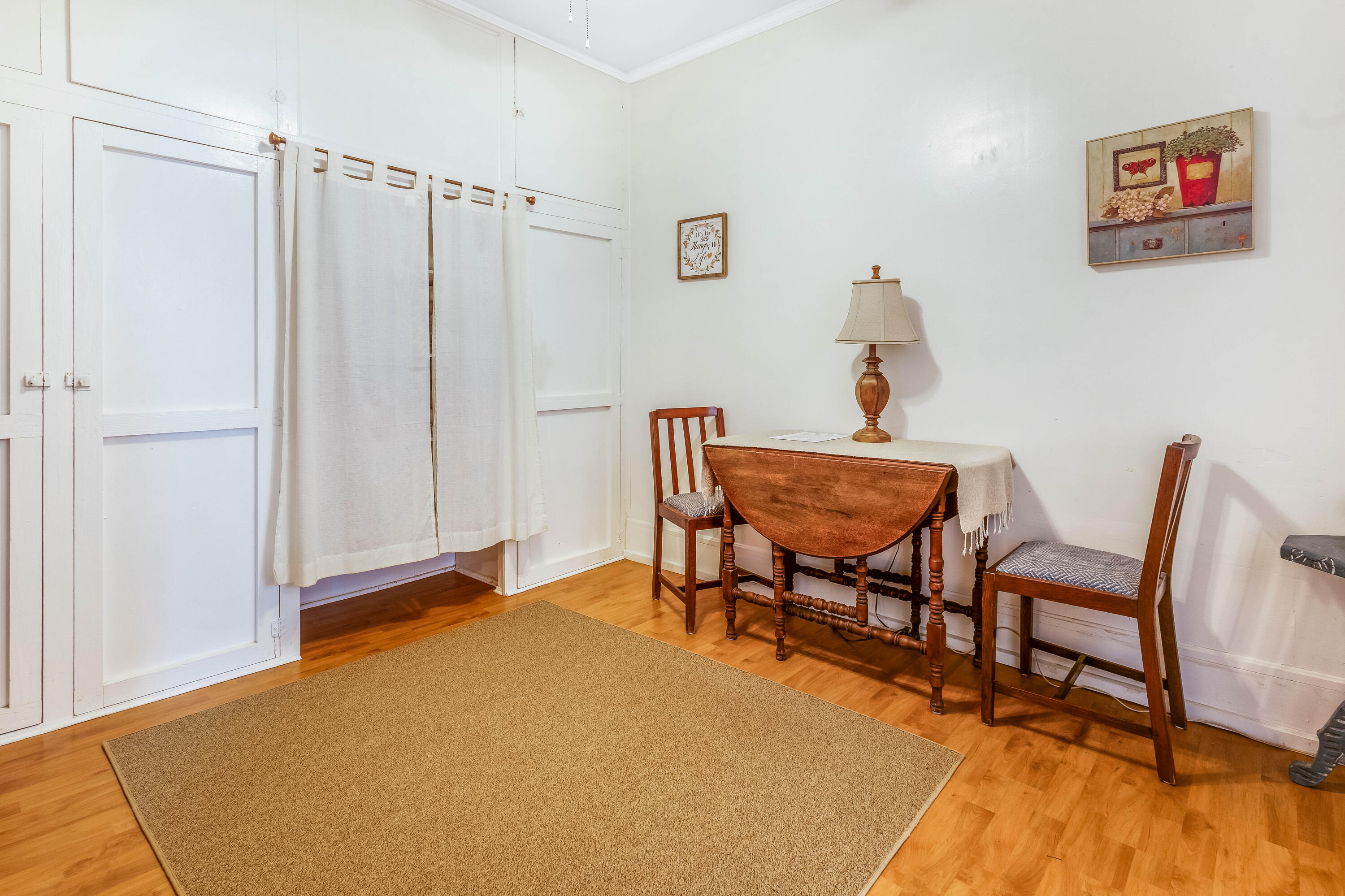 21132 Seminole Street Florala, AL 36455 - Photo 29 of 44 a view of a room with furniture and wooden floor