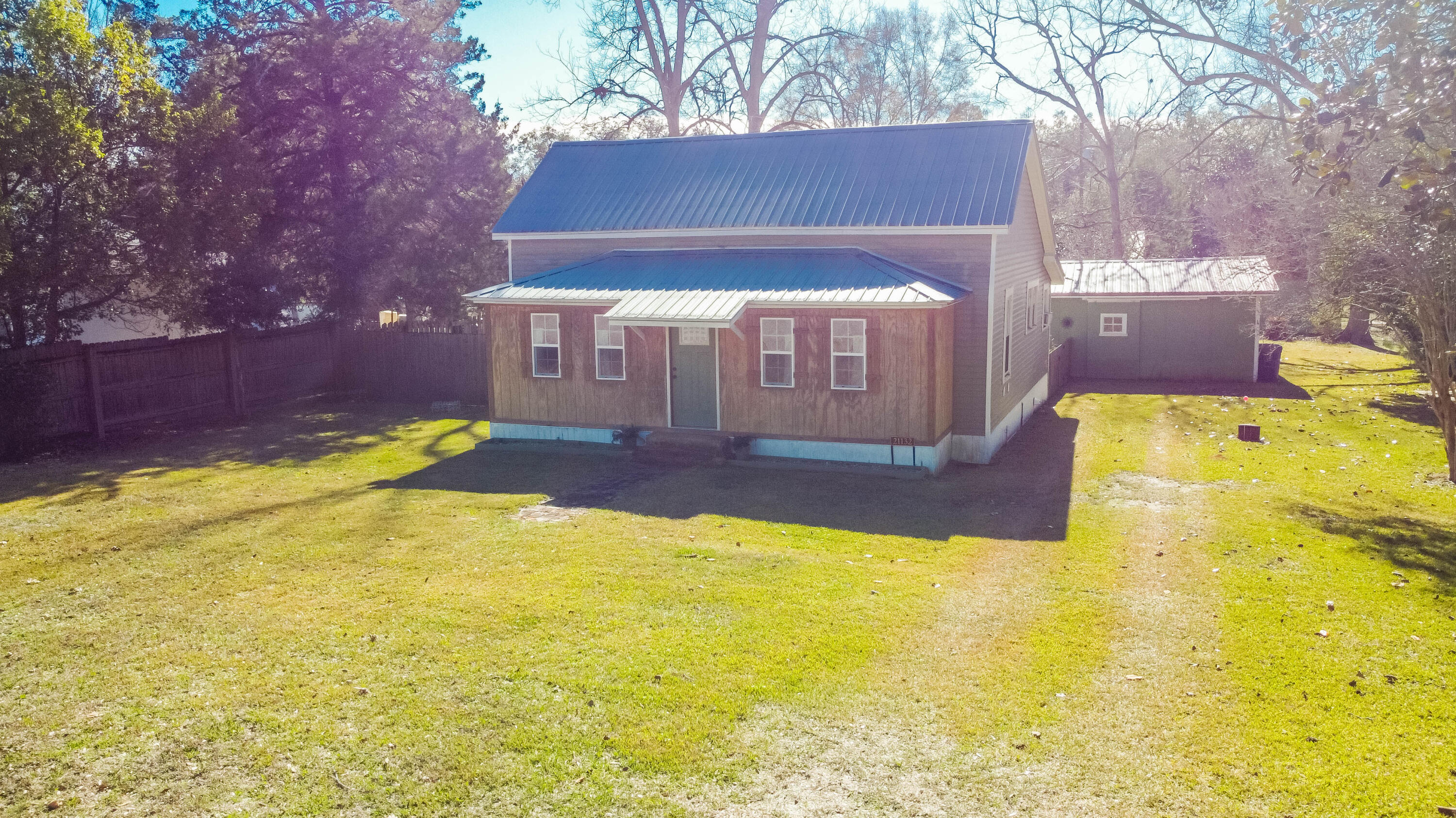 21132 Seminole Street Florala, AL 36455 - Photo 3 of 44 a view of a house with a swimming pool