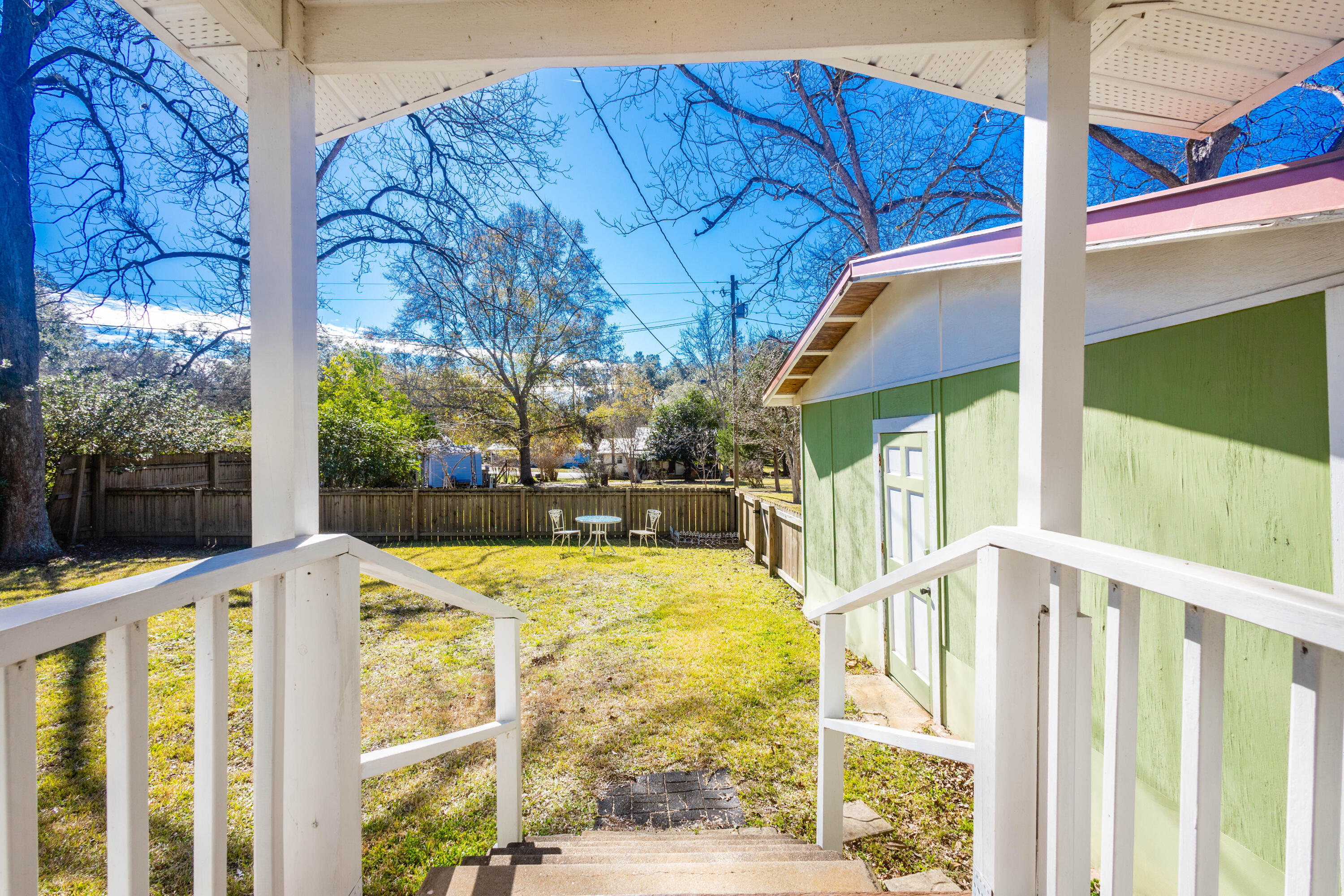 21132 Seminole Street Florala, AL 36455 - Photo 34 of 44 a view of a house with wooden floor and wooden fence