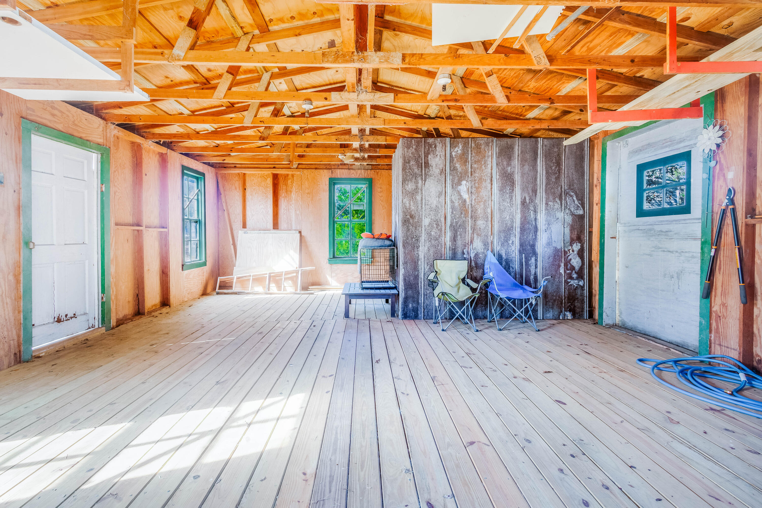 21132 Seminole Street Florala, AL 36455 - Photo 39 of 44 a view of a wooden chairs in a patio