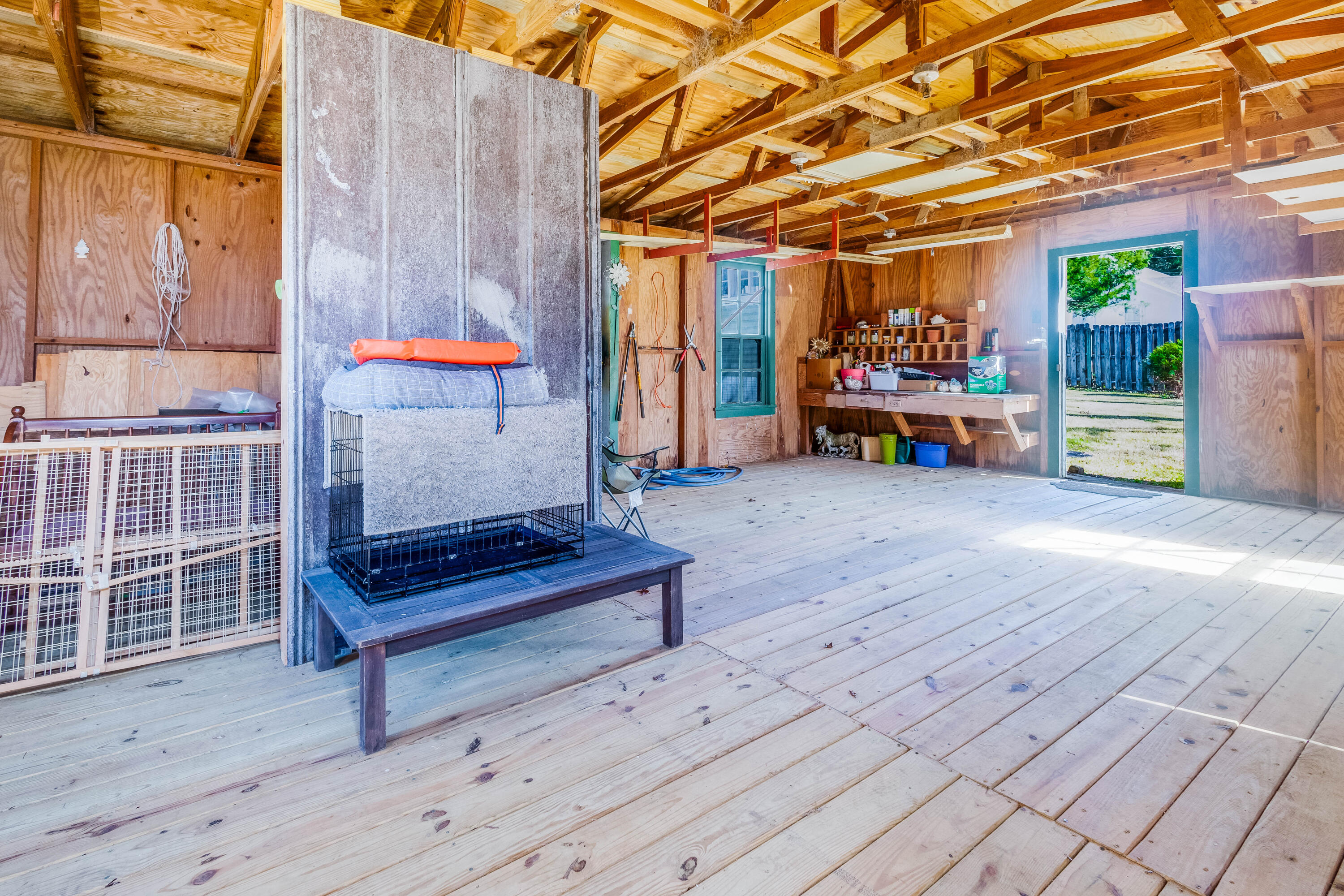 21132 Seminole Street Florala, AL 36455 - Photo 41 of 44 a view of a chairs and tables in the back yard of the house