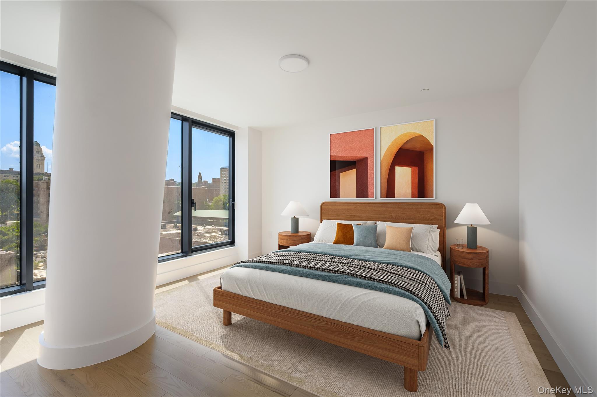 44 Hudson Street, Unit 912 Yonkers, NY 10701 - Photo 5 of 11 a bedroom with a bed and a window