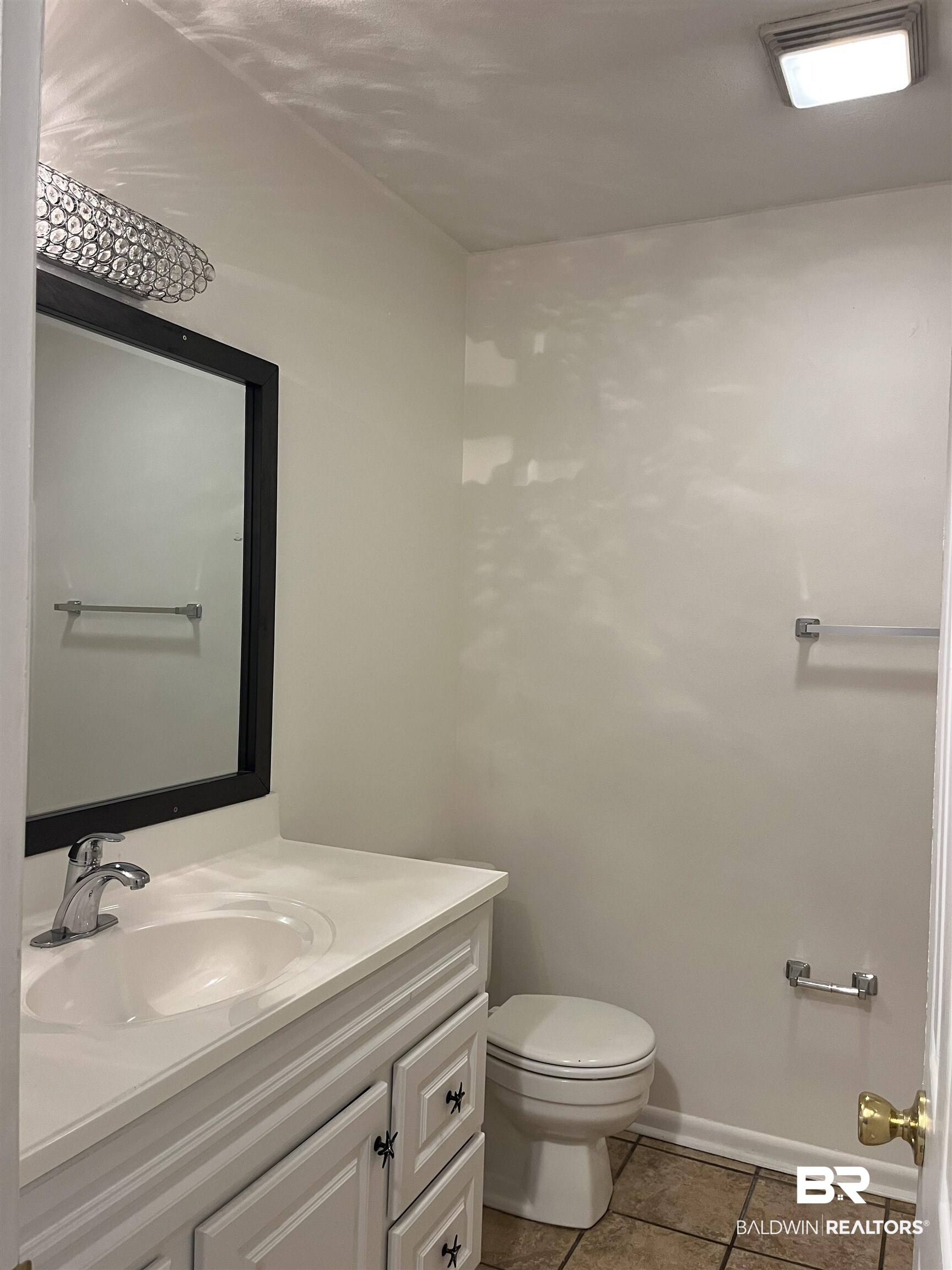 1146 North Alston Street Foley, AL 36535 - Photo 14 of 20 Bathroom featuring vanity and light tile patterned floors