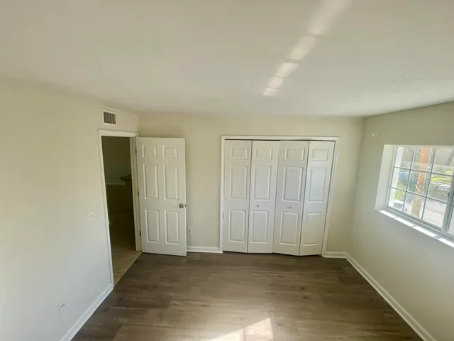 an empty room with windows