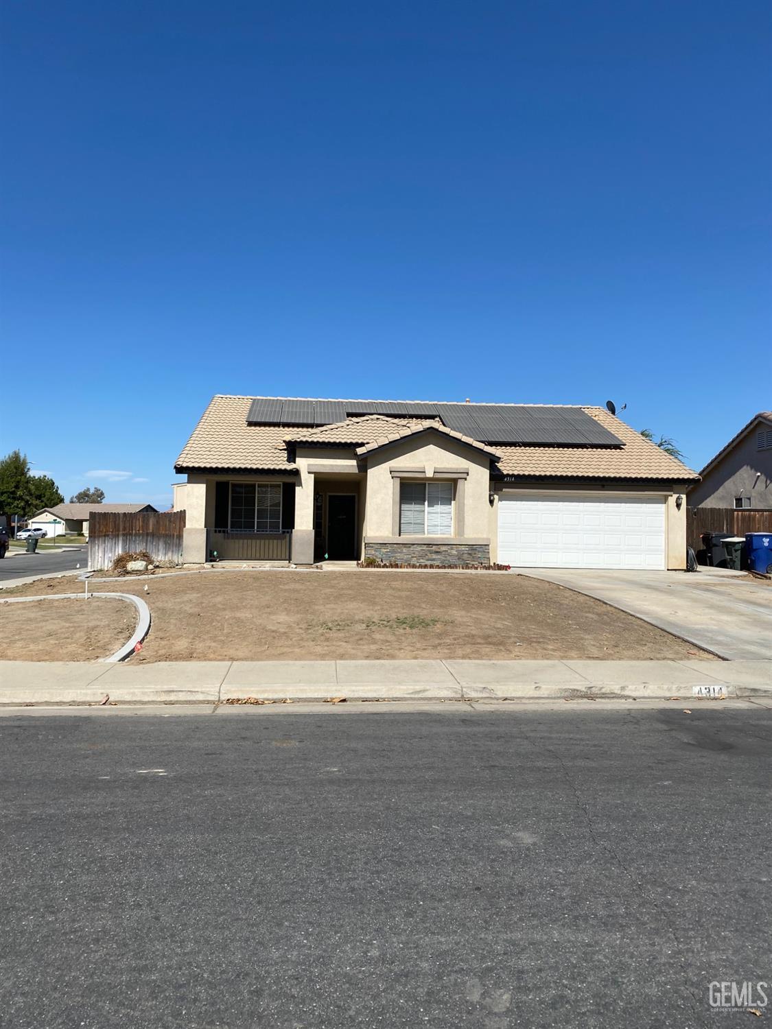 a view of street with a car parked on the road