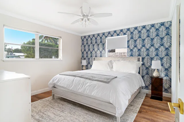 a bathroom with a sink a mirror and vanity