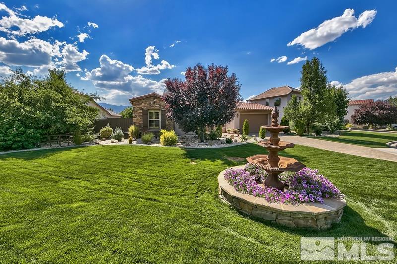 650 Ubaldo Court Reno, NV 89521 - Photo 1 of 1 a swimming pool with barbeque oven outdoor seating and yard