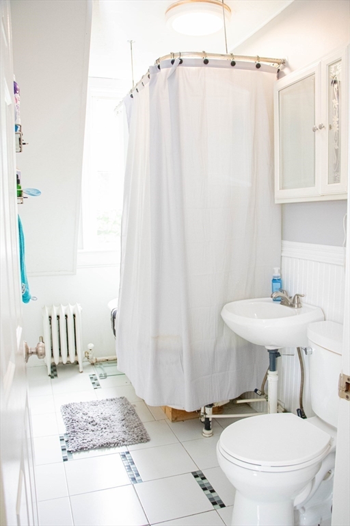 85-87 Slater Street Webster, MA 01570 - Photo 20 of 41 a bathroom with a sink toilet and shower