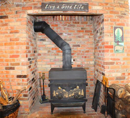 2465 Evergreen Road Colorado Springs, CO 80921 - Photo 20 of 25 Delightful wood burning stove for your enjoyment