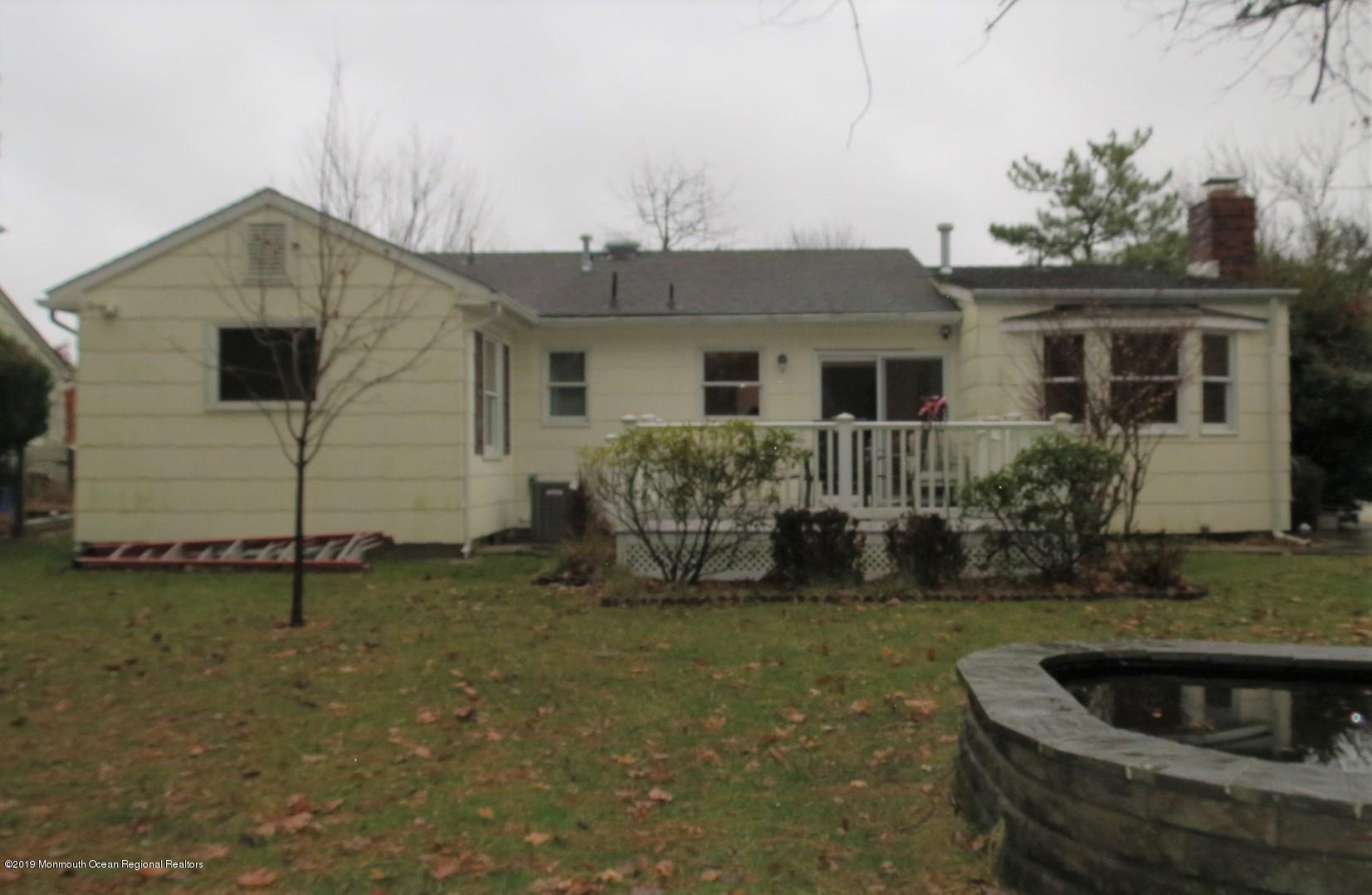 24 Coventry Road Toms River, NJ 08757 - Photo 17 of 21 a house view with a garden space