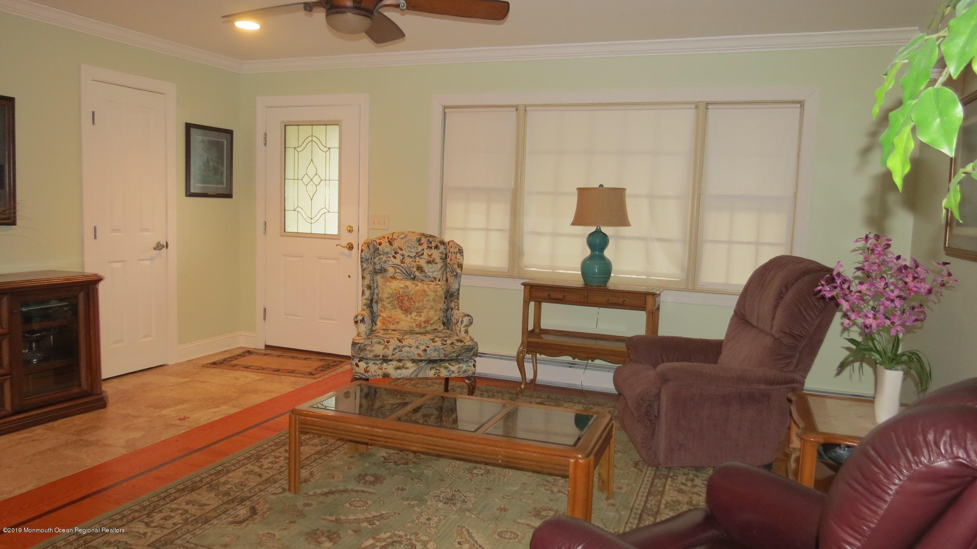 24 Coventry Road Toms River, NJ 08757 - Photo 3 of 21 a living room with furniture and a fireplace