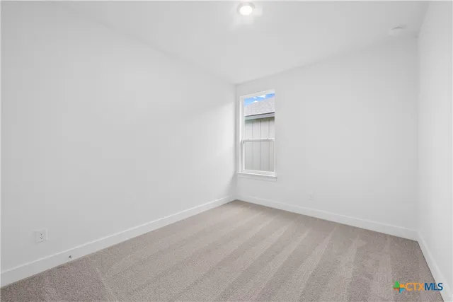 a bathroom with a granite countertop sink a toilet and bathtub