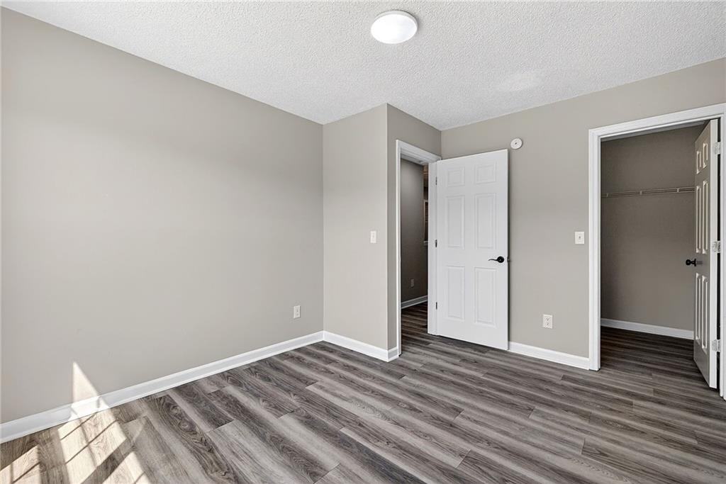 1065 Maple Valley Court Union City, GA 30291 - Photo 22 of 29 a view of room with wooden floor and bathroom