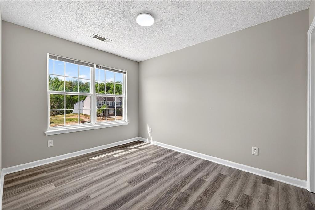 1065 Maple Valley Court Union City, GA 30291 - Photo 23 of 29 an empty room with a window