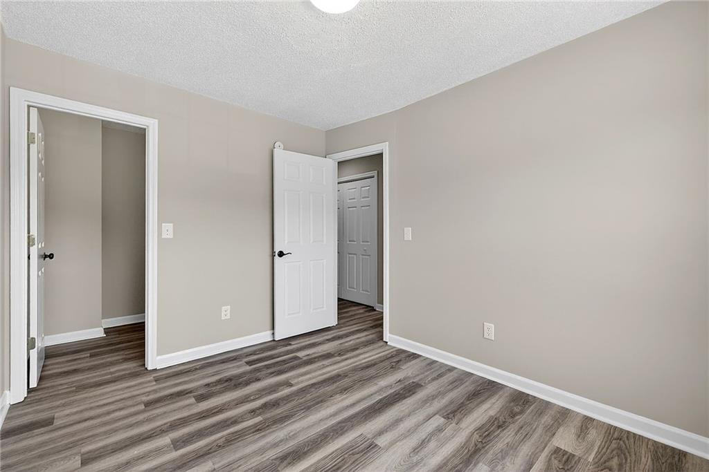 1065 Maple Valley Court Union City, GA 30291 - Photo 24 of 29 a view of a room with wooden floor