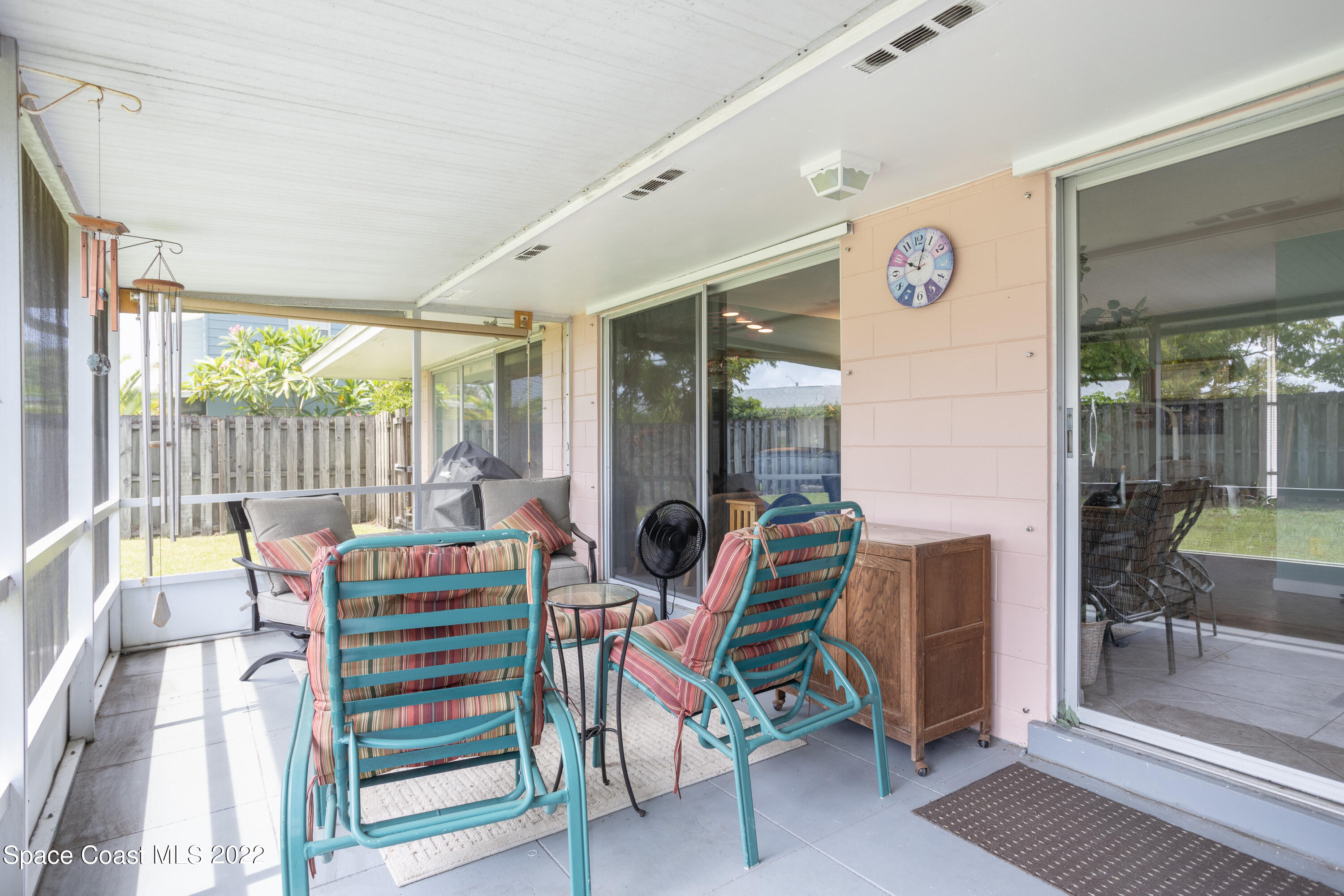 947 Brunswick Lane Rockledge, FL 32955 - Photo 18 of 22 a bedroom with furniture and a large window