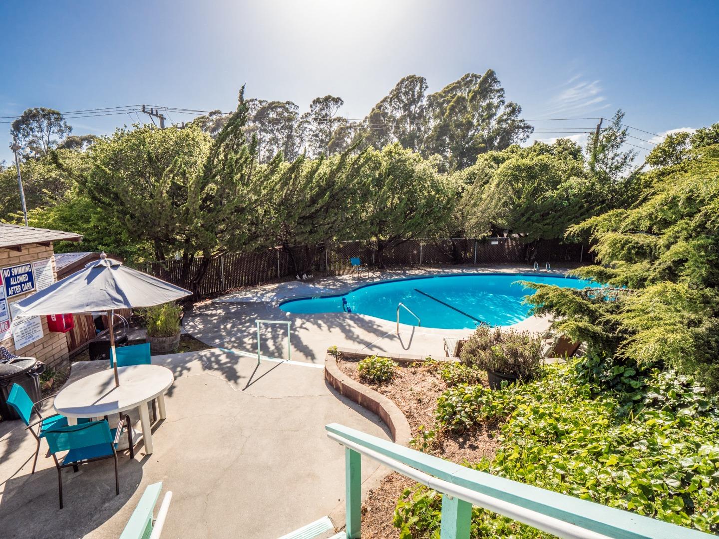 100 North Rodeo Gulch Road, Unit 65 Soquel, CA 95073 - Photo 22 of 24 a view of a swimming pool with a patio