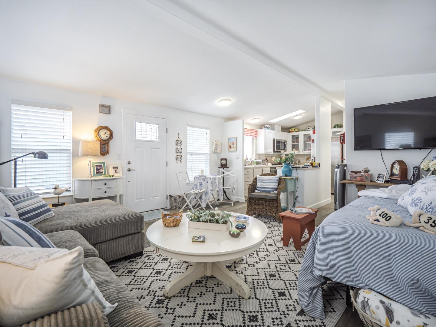 100 North Rodeo Gulch Road, Unit 65 Soquel, CA 95073 - Photo 9 of 24 a view of a dining room with furniture