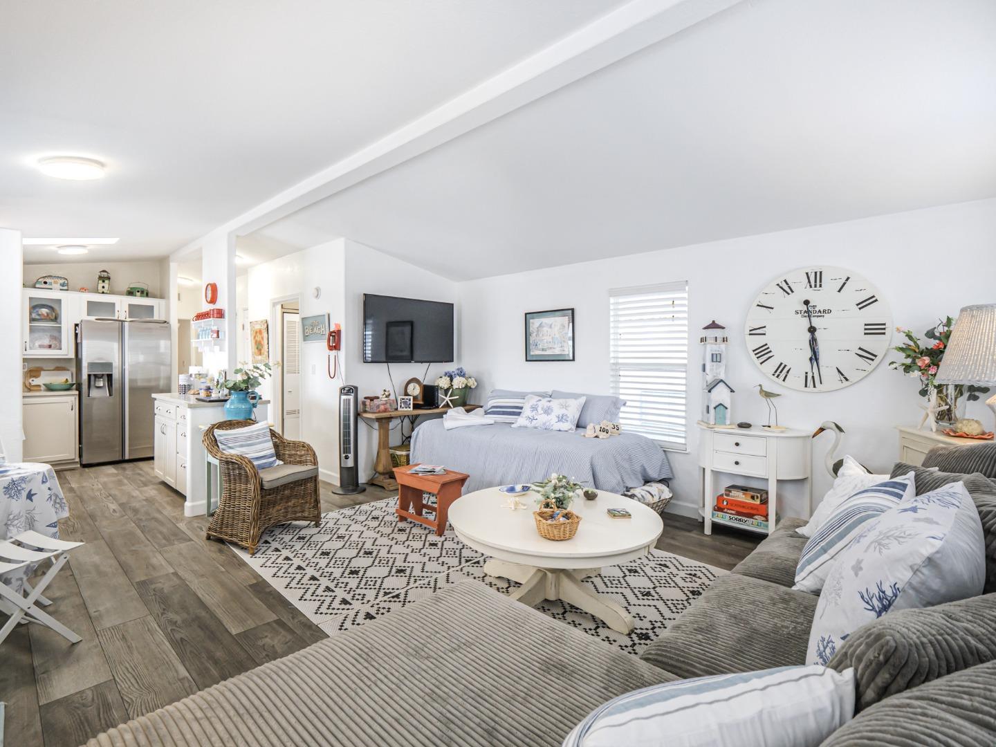 100 North Rodeo Gulch Road, Unit 65 Soquel, CA 95073 - Photo 10 of 24 a living room with furniture and wooden floor
