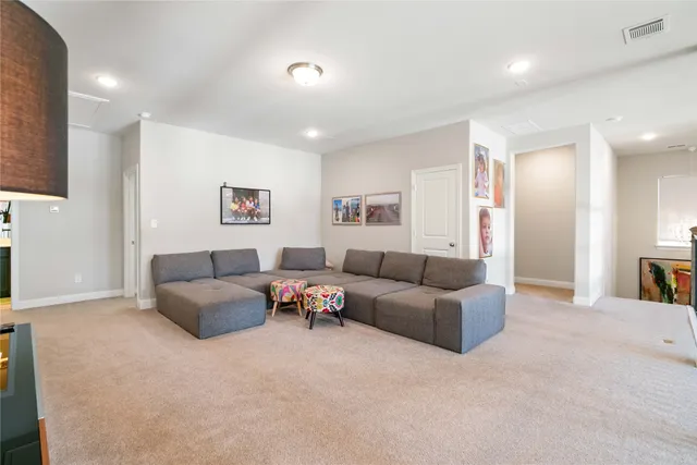a living room with furniture and a couch