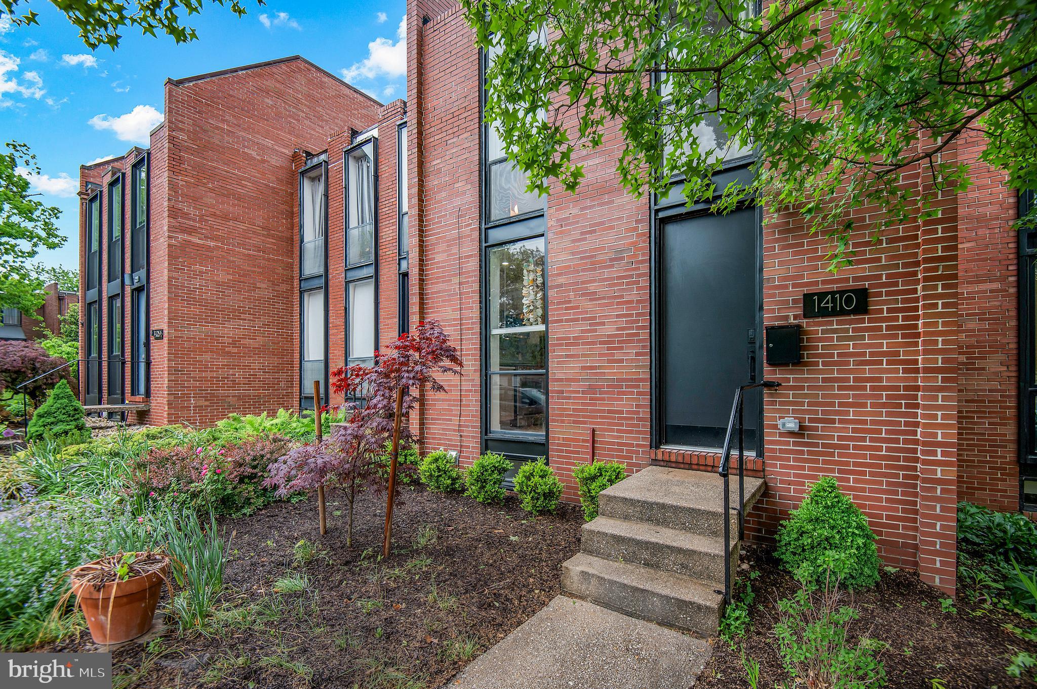 1410 Mason Street Baltimore, MD 21217 - Photo 2 of 24 a front view of a house with a yard