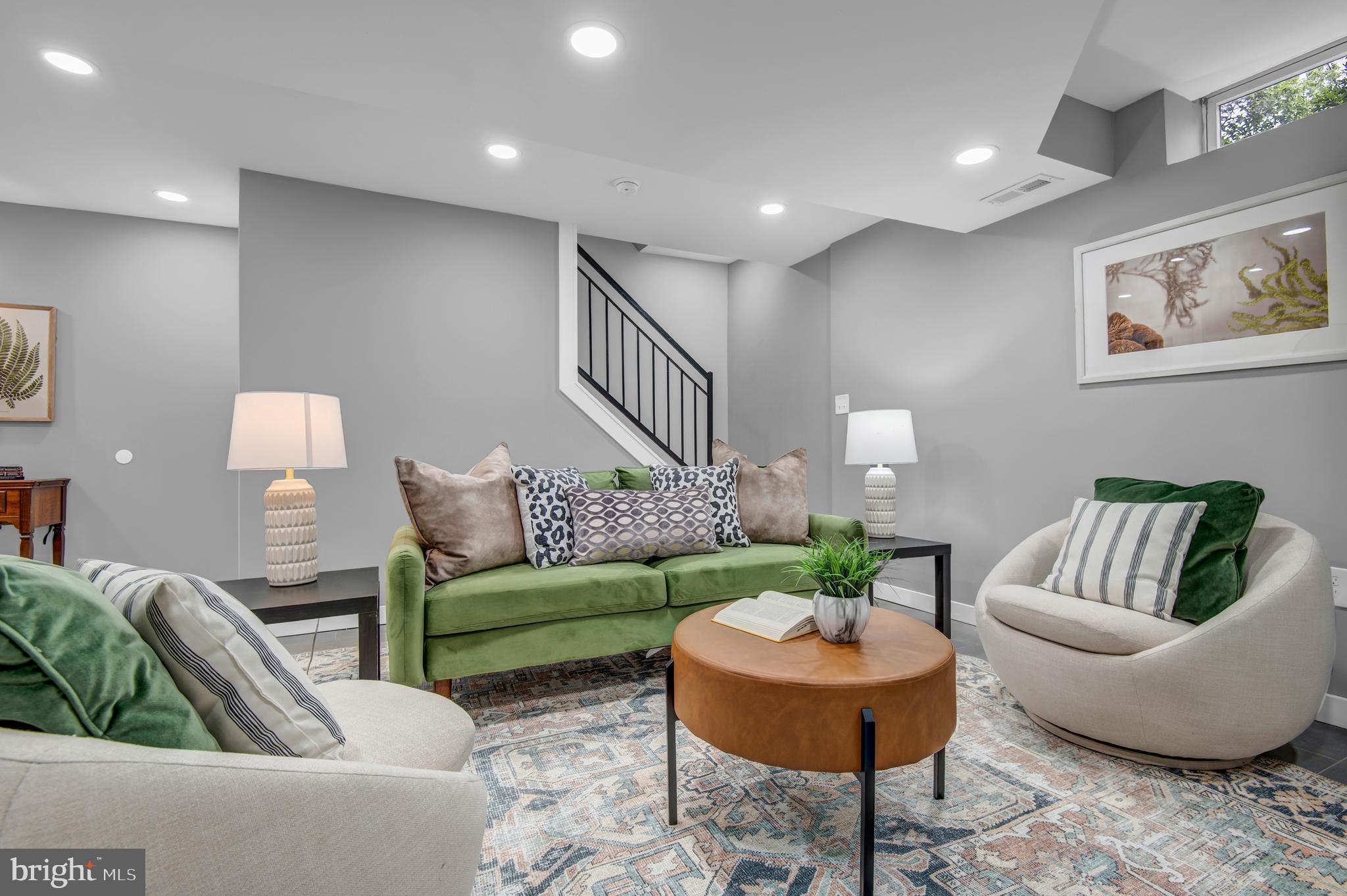 1410 Mason Street Baltimore, MD 21217 - Photo 22 of 24 a living room with furniture and a rug