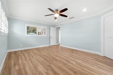 a bathroom with a shower and a tub