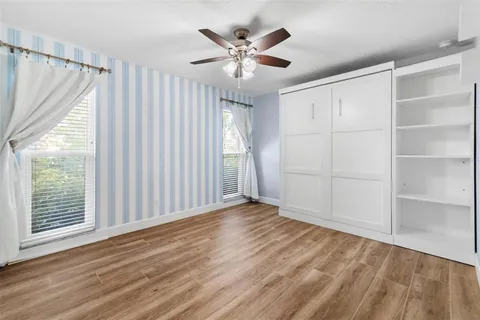 a swimming pool with outdoor seating yard and patio