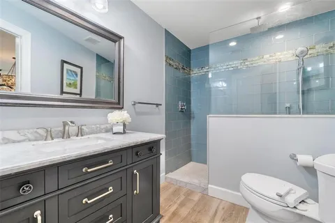 a view of a swimming pool with a table and chairs