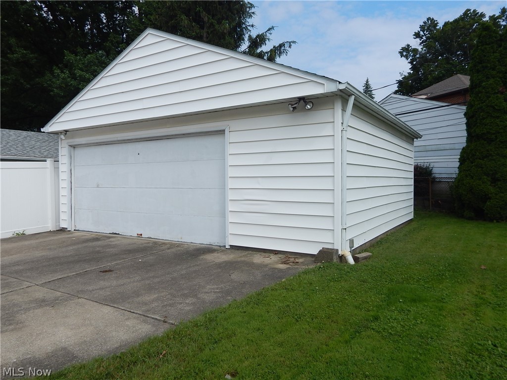 5701 Ackley Road Parma, OH 44129 - Photo 28 of 31 Very spacious 2.5 Car Garage has Opener and is Sided.