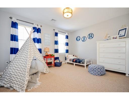 4 Comstock Place Rochester, MA 02770 - Photo 15 of 23 a bedroom with furniture and a lamp
