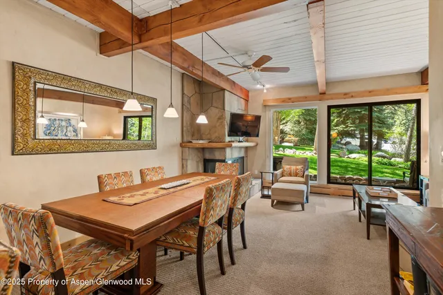 a kitchen with a refrigerator and a sink