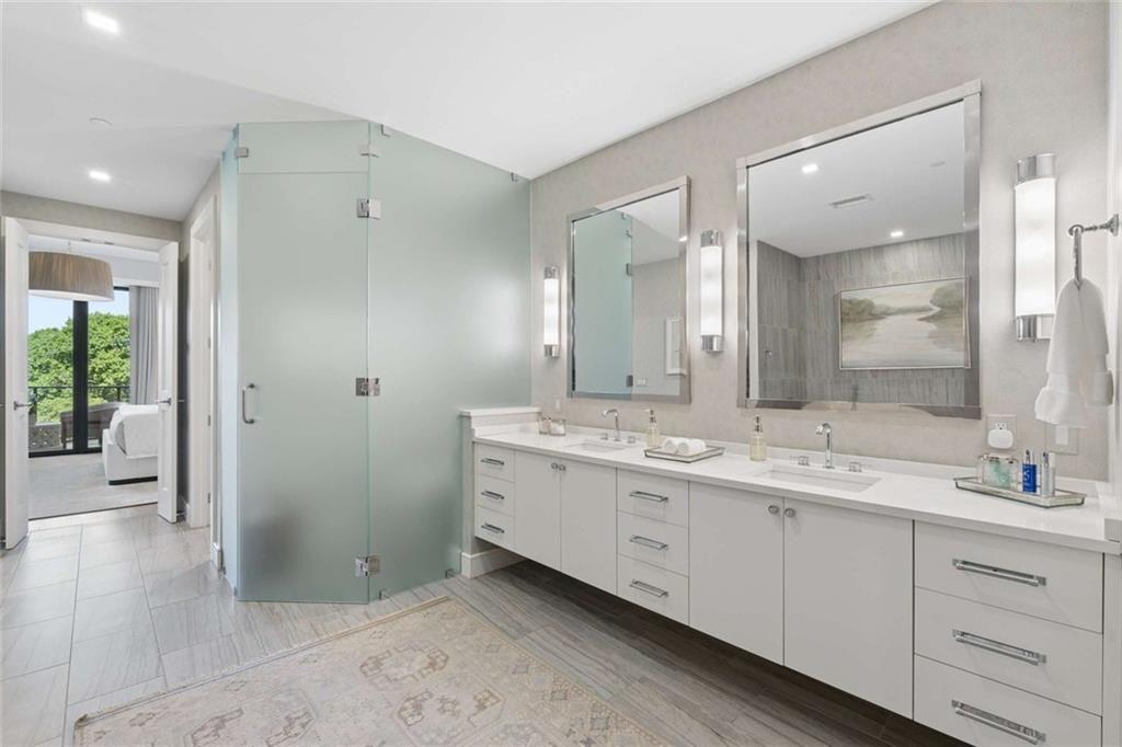 2520 Peachtree Road, Unit 603 Atlanta, GA 30305 - Photo 41 of 91 a spacious bathroom with a double vanity sink toilet and shower
