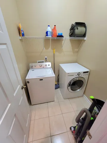 a view of a walk in front of building