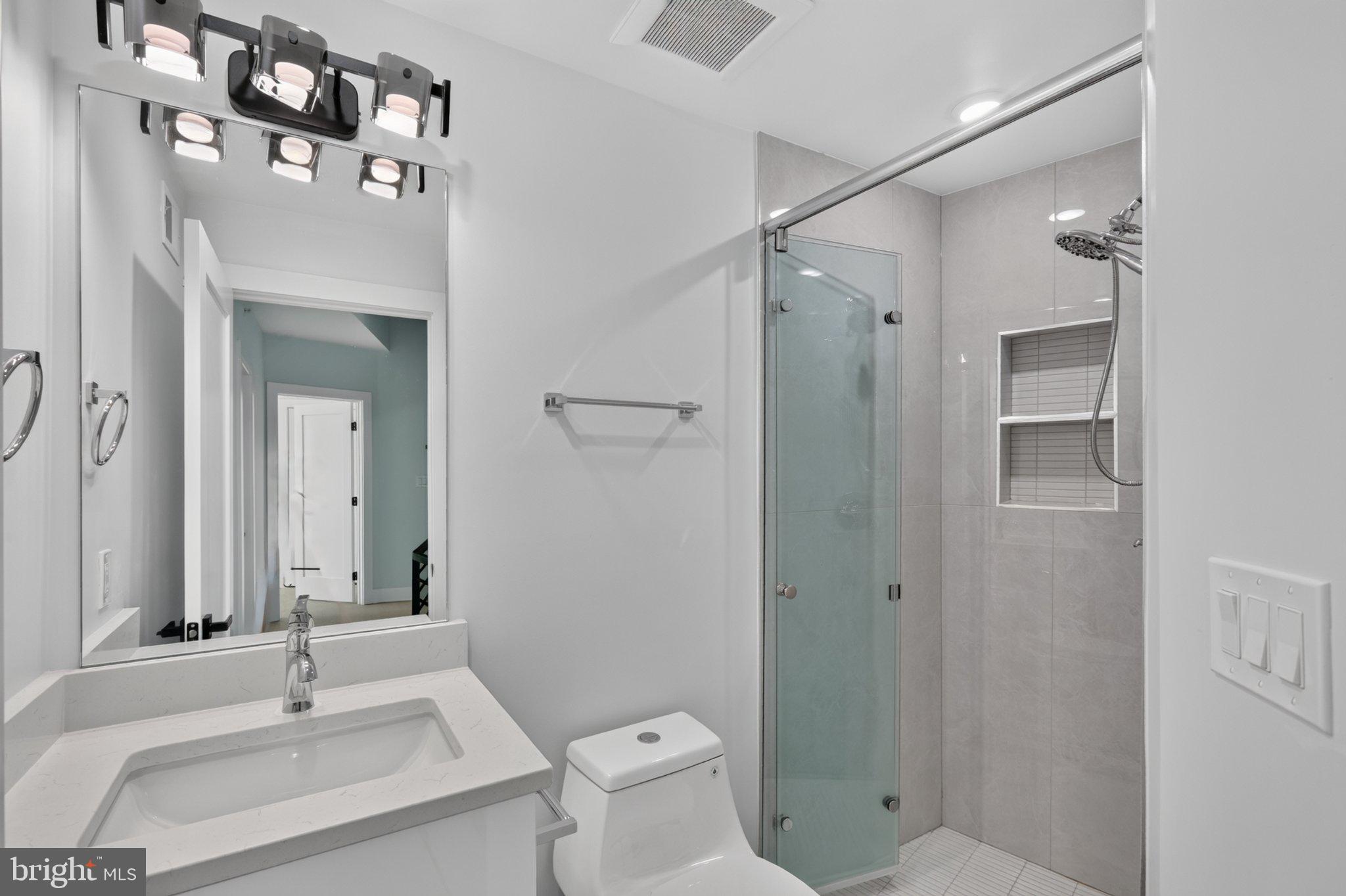 1650 Columbia Road Northwest, Unit 401 Washington, DC 20009 - Photo 16 of 21 Sleek modern bathroom oasis.