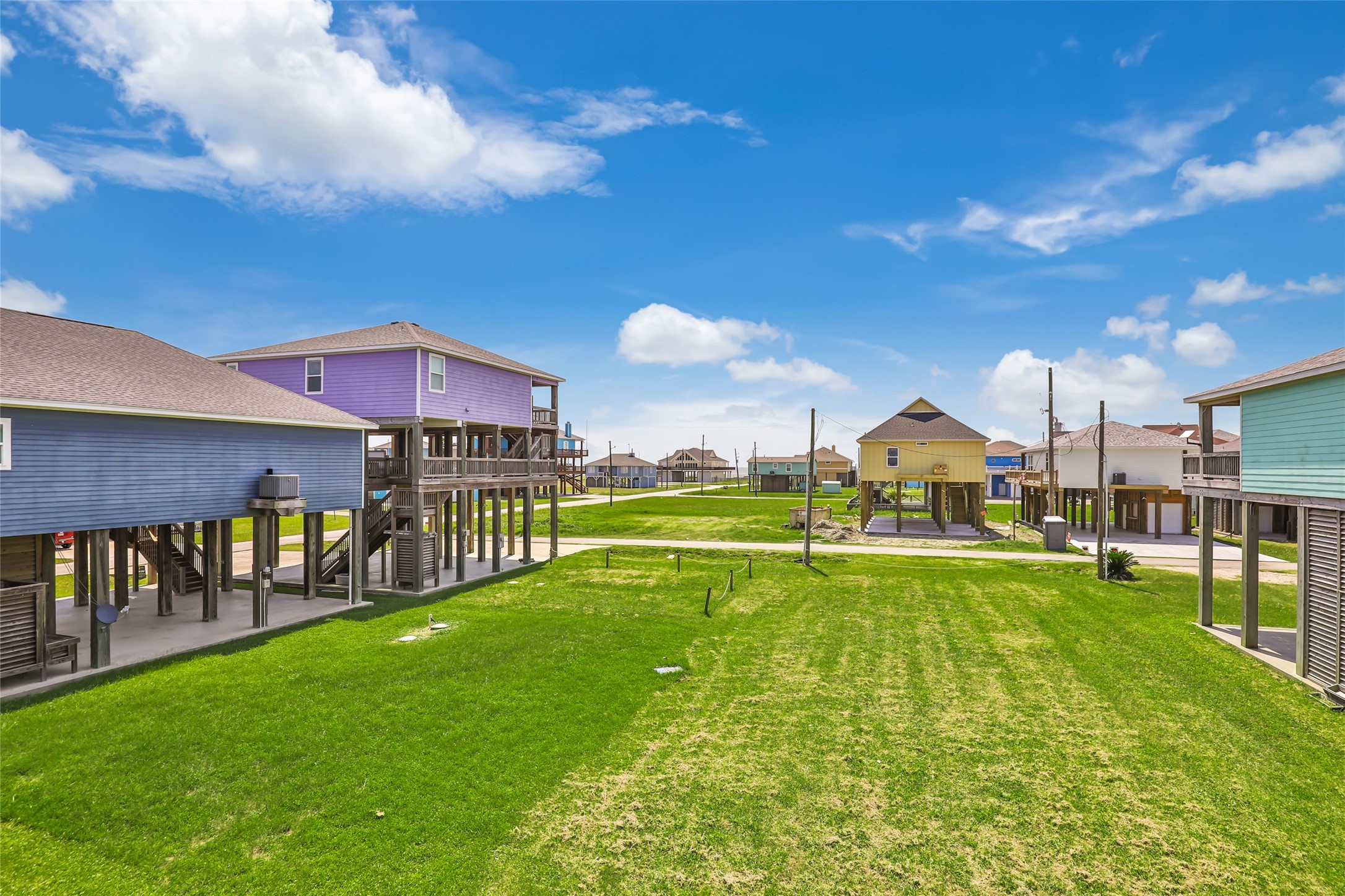 2116 Canal Crystal Beach, TX 77650 - Photo 19 of 45 a view of a house with a yard