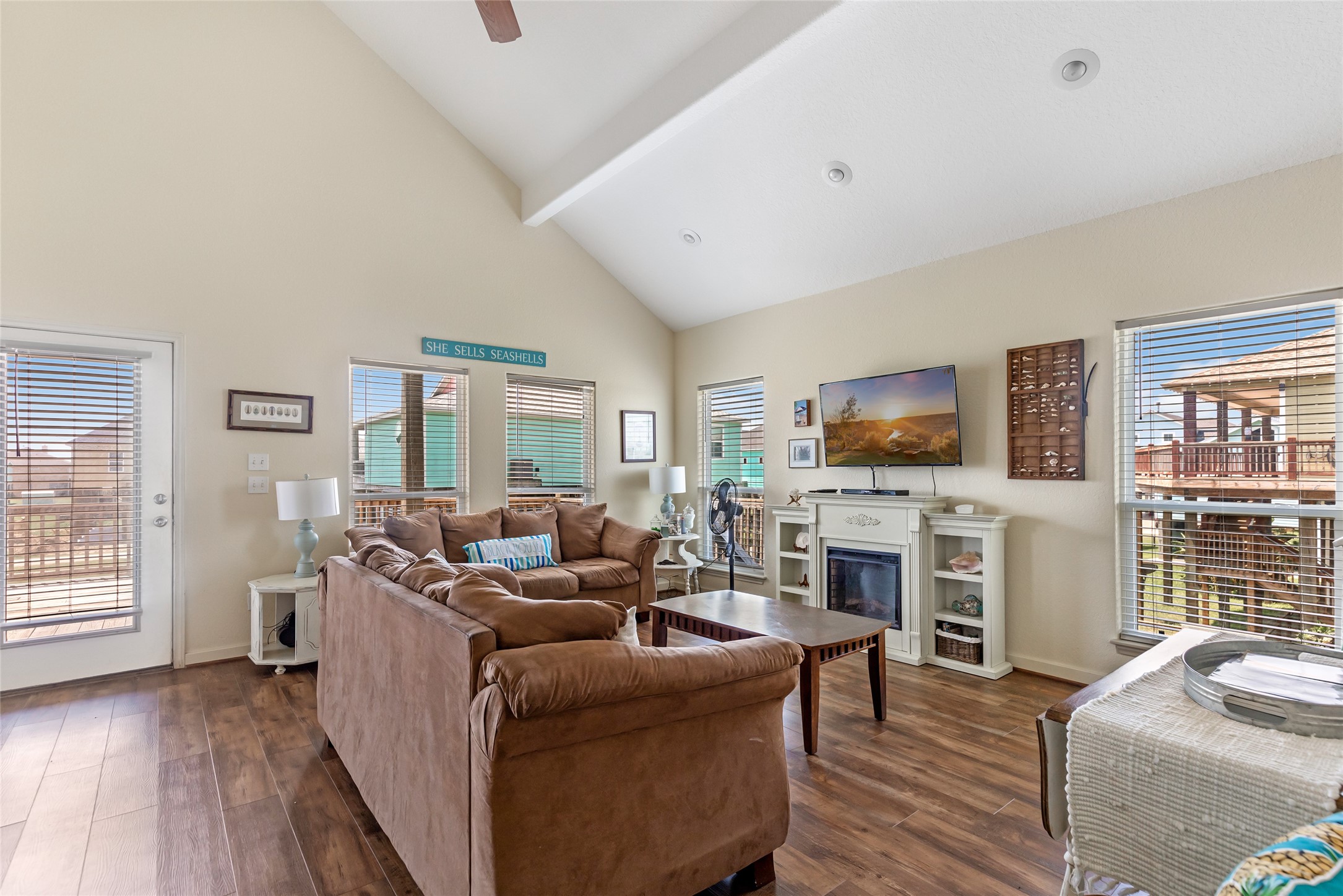 2116 Canal Crystal Beach, TX 77650 - Photo 22 of 45 a living room with furniture flat screen tv and a fireplace