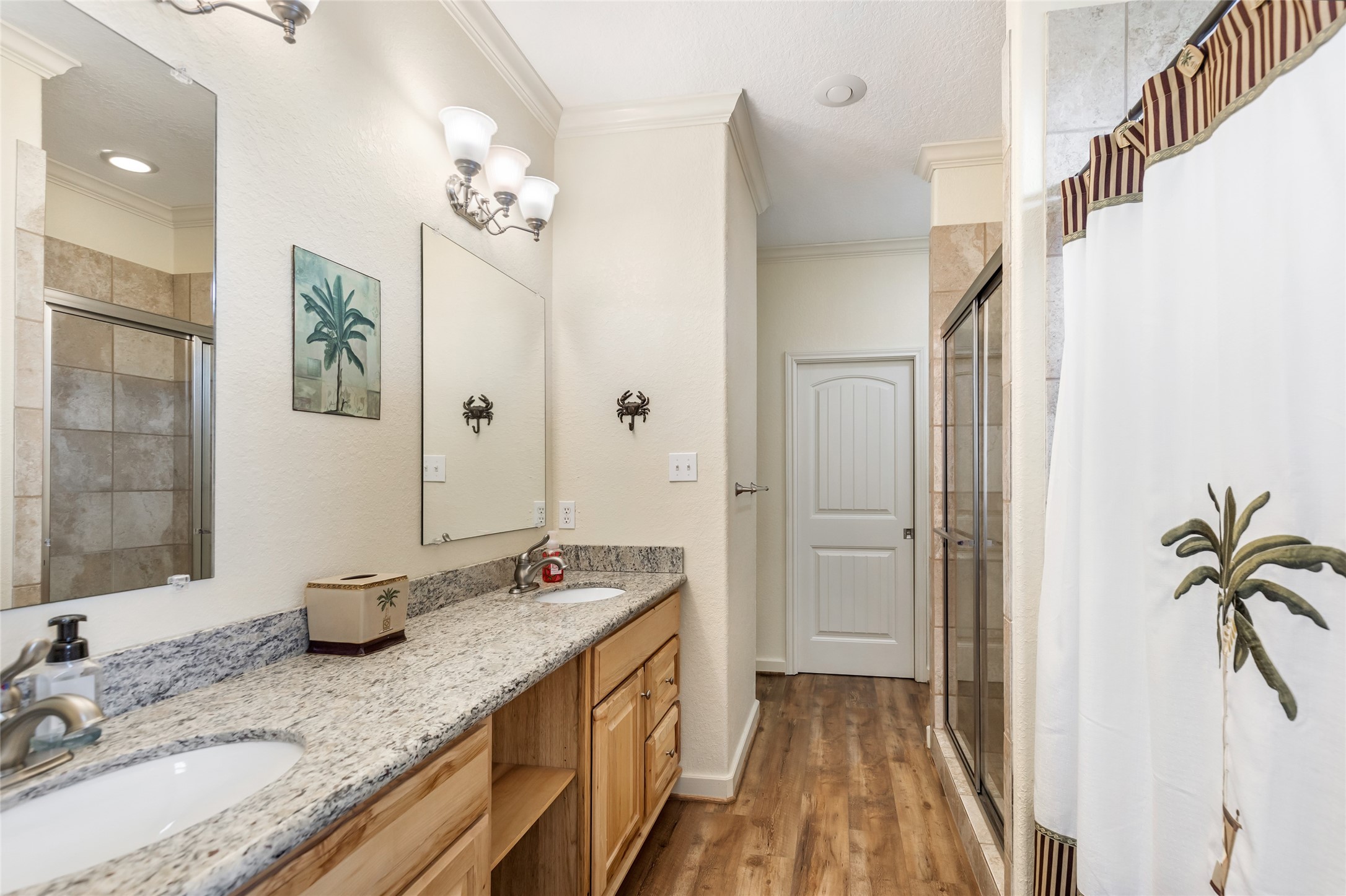 2116 Canal Crystal Beach, TX 77650 - Photo 35 of 45 a spacious bathroom with a granite countertop sink a mirror and shower