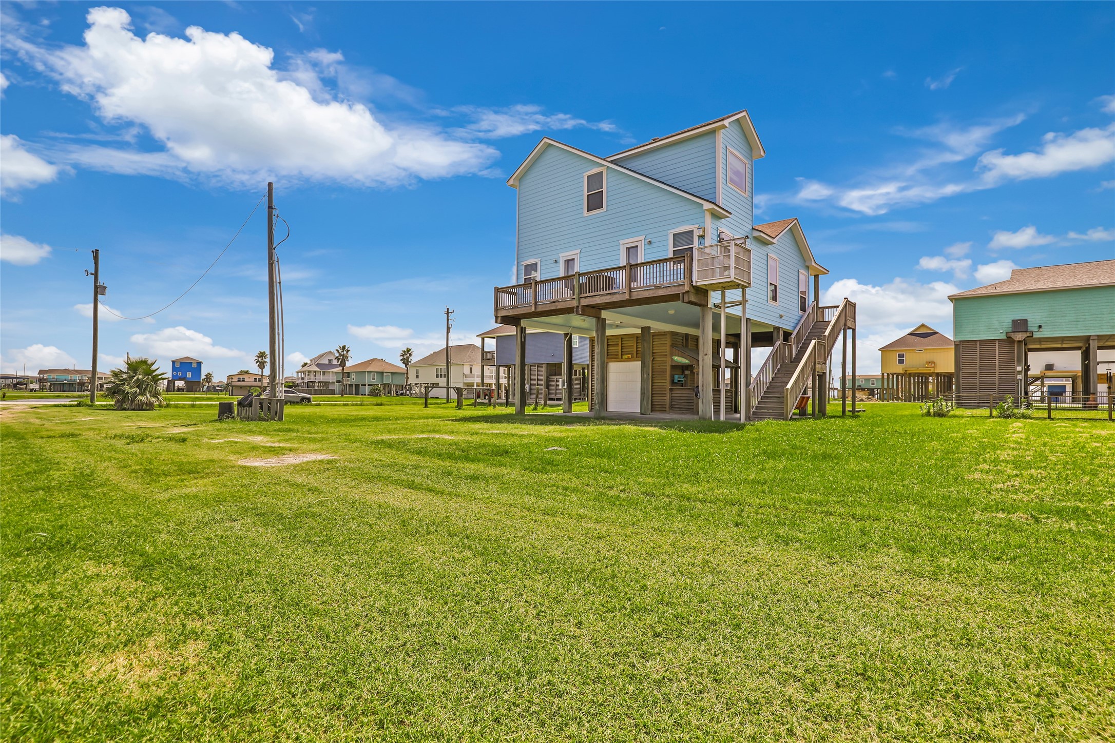 2116 Canal Crystal Beach, TX 77650 - Photo 5 of 45 a view of a house with a big yard
