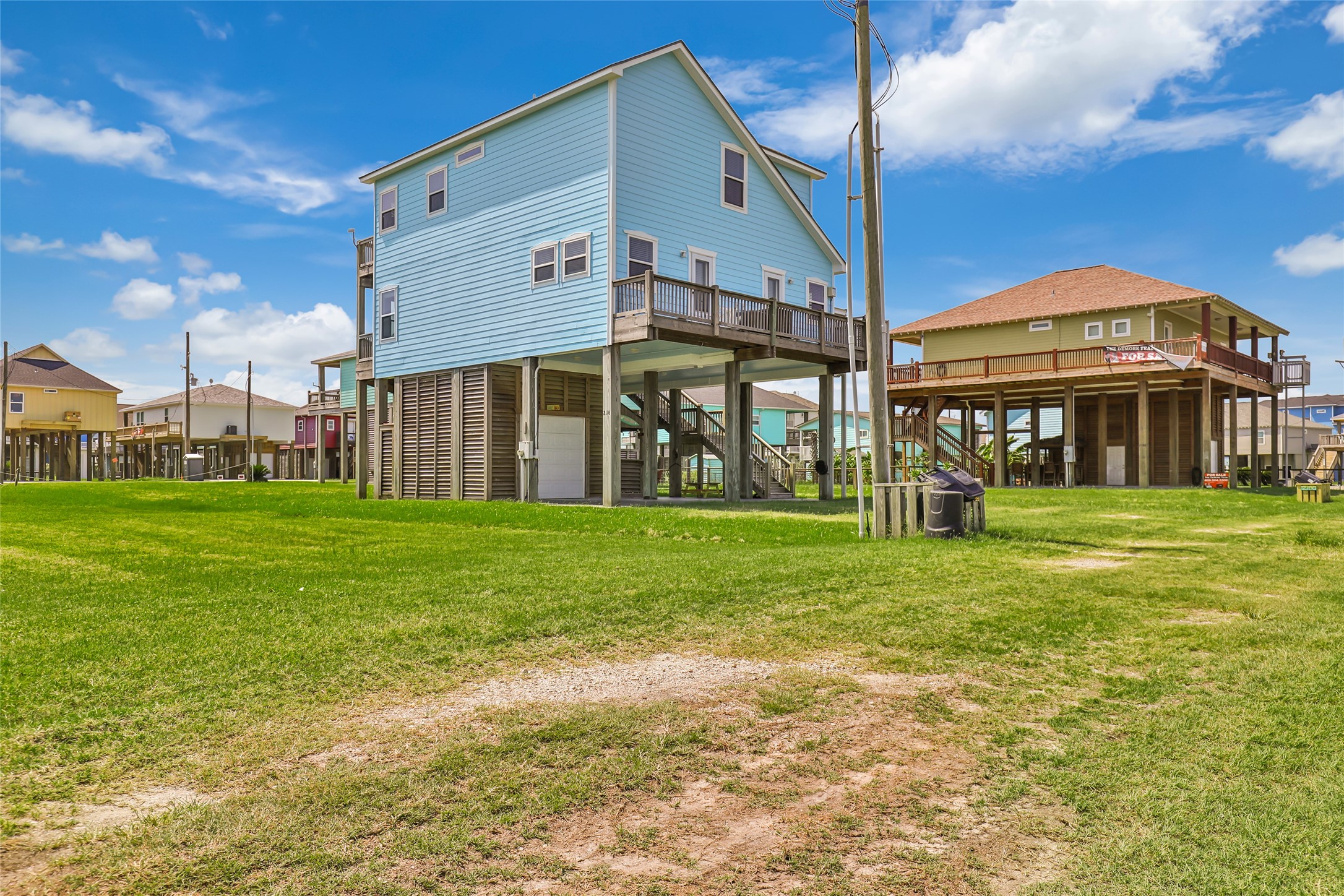 2116 Canal Crystal Beach, TX 77650 - Photo 6 of 45 a front view of a house with garden