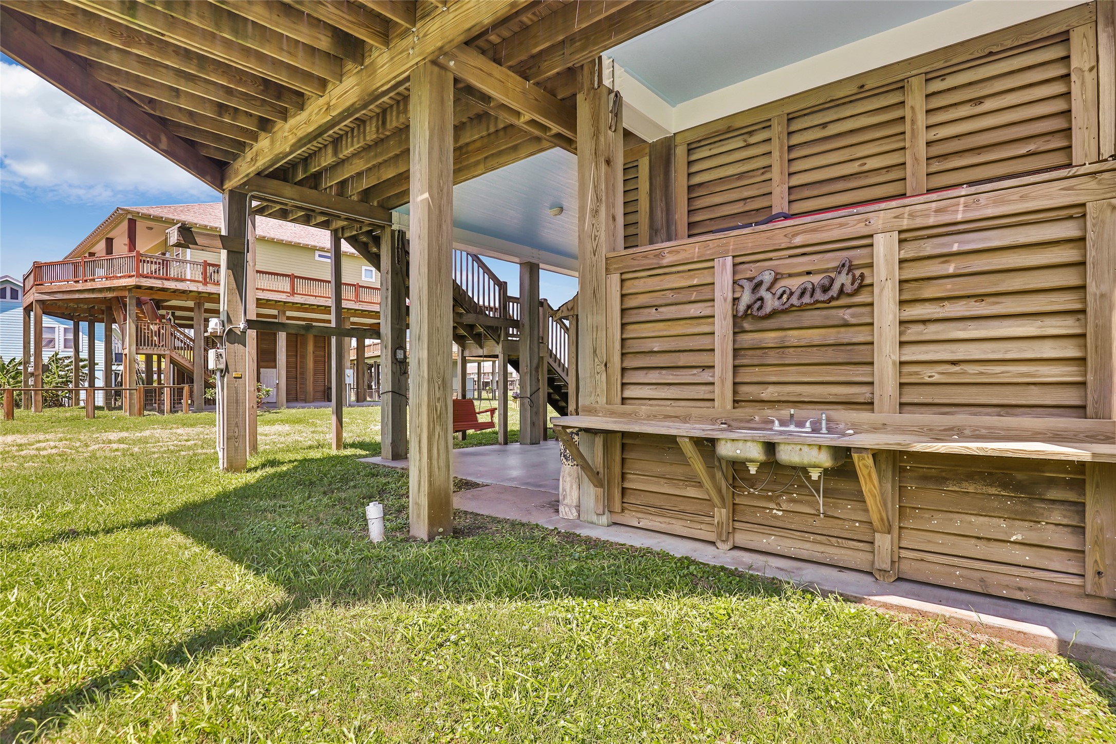 2116 Canal Crystal Beach, TX 77650 - Photo 10 of 45 a front view of a house with a yard
