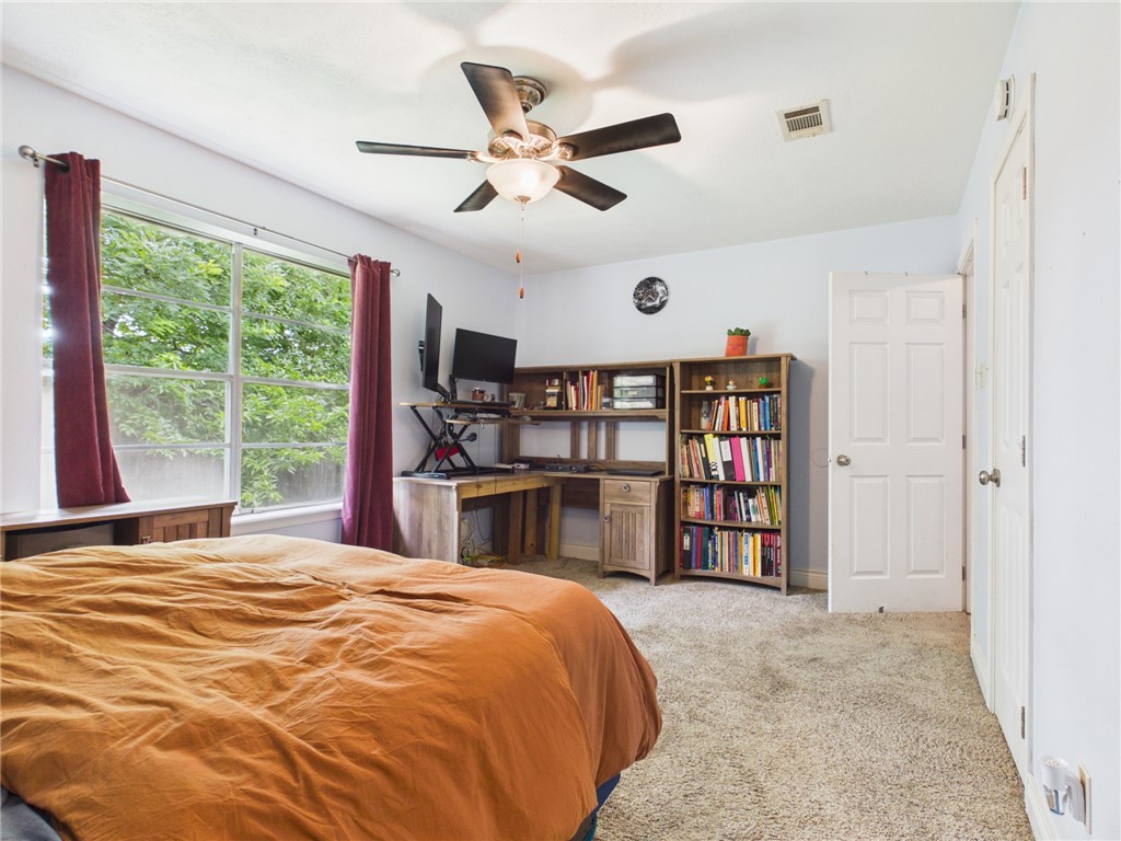 800 Rio Grande Lane Bryan, TX 77801 - Photo 15 of 23 a bed room with a bed and a large window