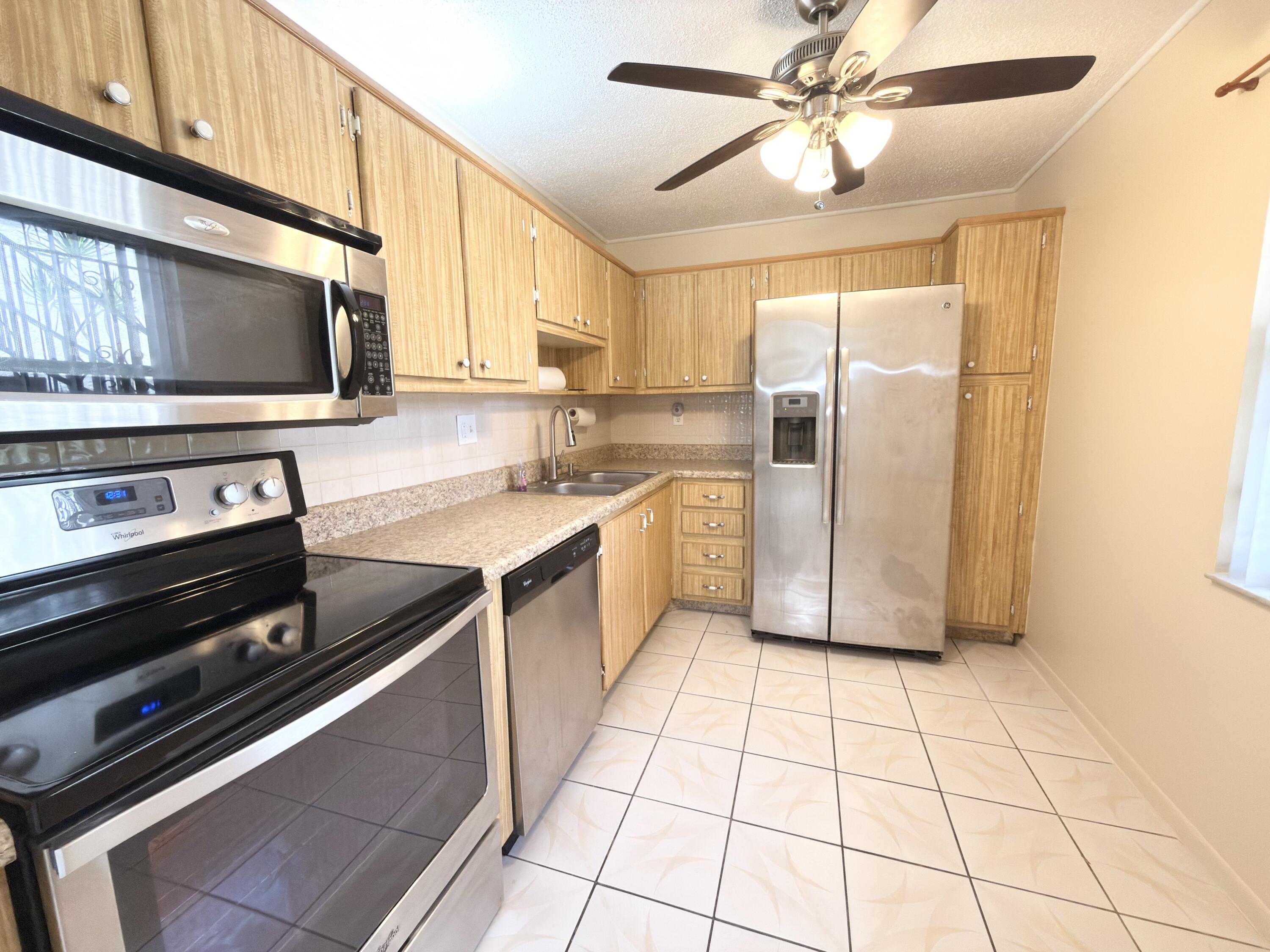 7650 West McNab Road, Unit 210 Tamarac, FL 33321 - Photo 2 of 13 Kitchen