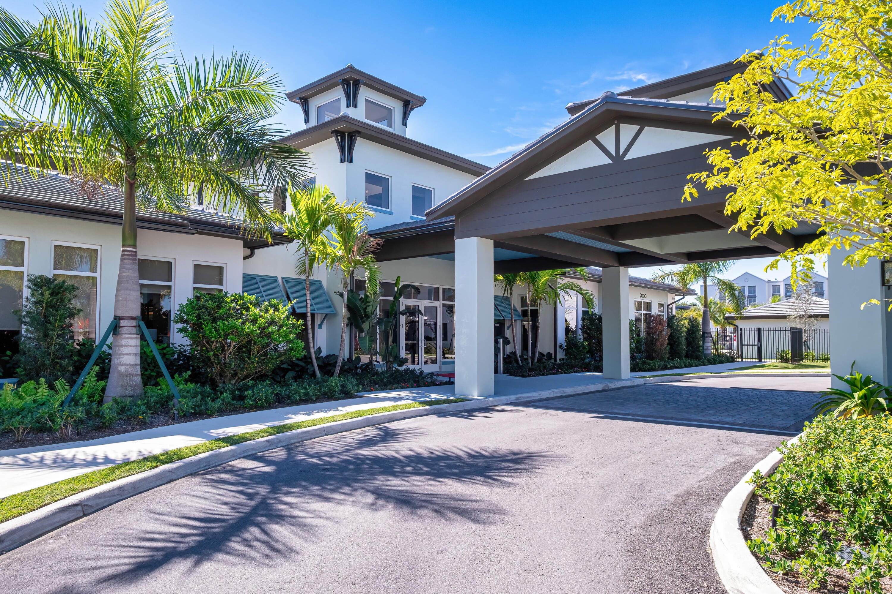 2000 Stirling Road, Unit 3204 Hollywood, FL 33020 - Photo 2 of 35 a front view of a house with a yard