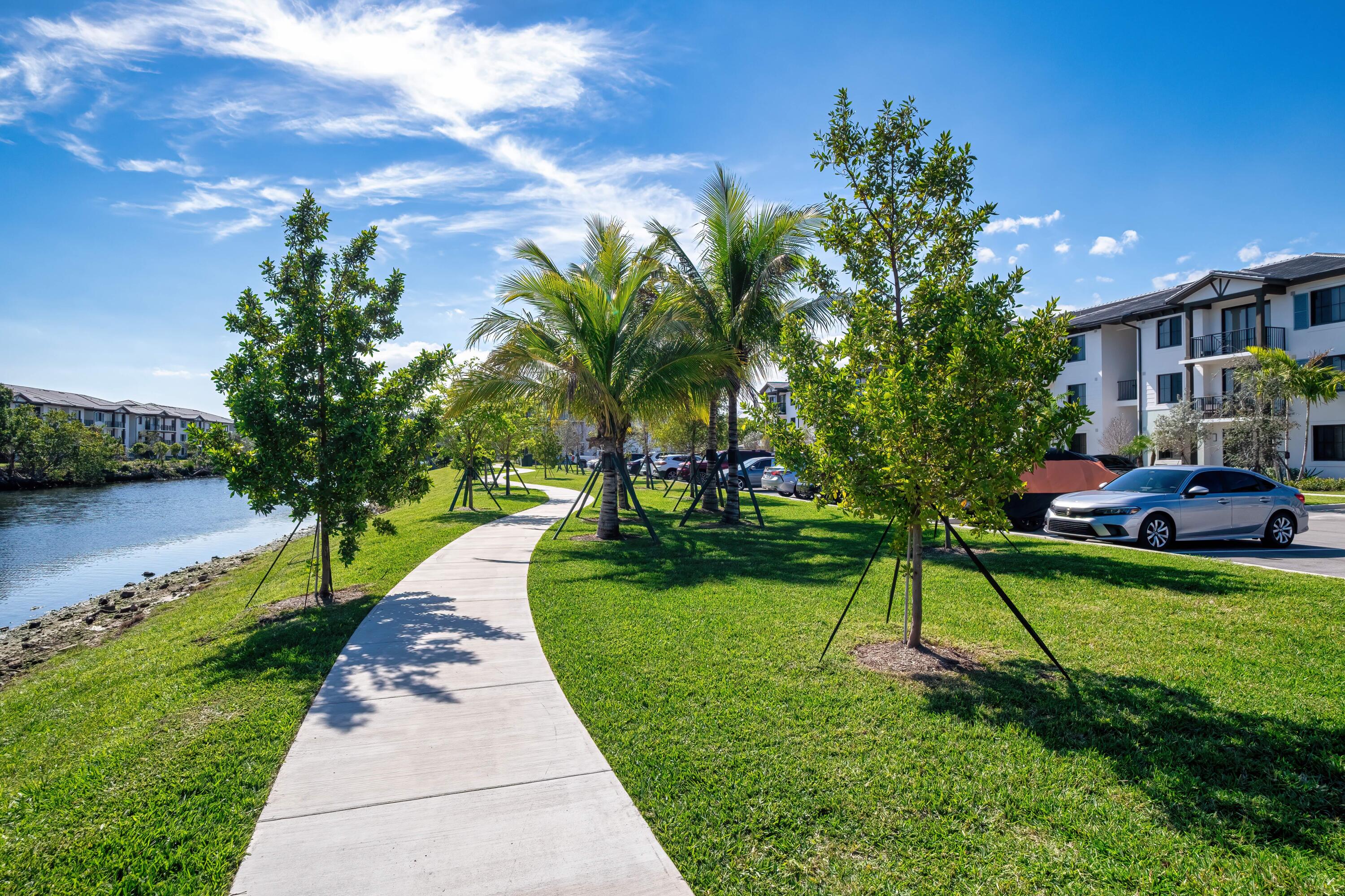 2000 Stirling Road, Unit 3204 Hollywood, FL 33020 - Photo 5 of 35 a view of a park with plants and palm trees