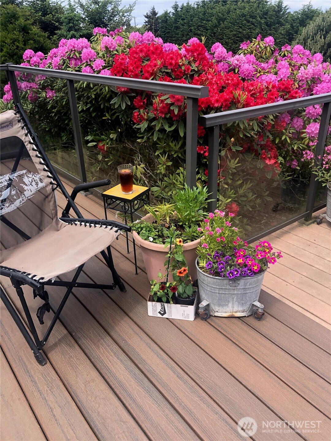 81 Bon Jon View Way Sequim, WA 98382 - Photo 7 of 38 a view of a table and chairs in a patio